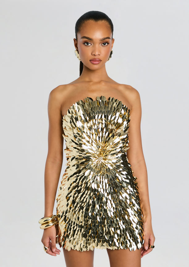 Kariella Embellished Dress worn strapless as a gold and silver sequin mini dress on a model.