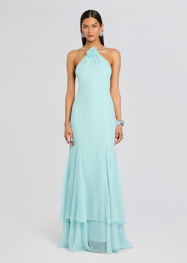 Front view of the pale blue Lirael Chiffon Dress with a halter neckline and a floral rosette at the neckline.