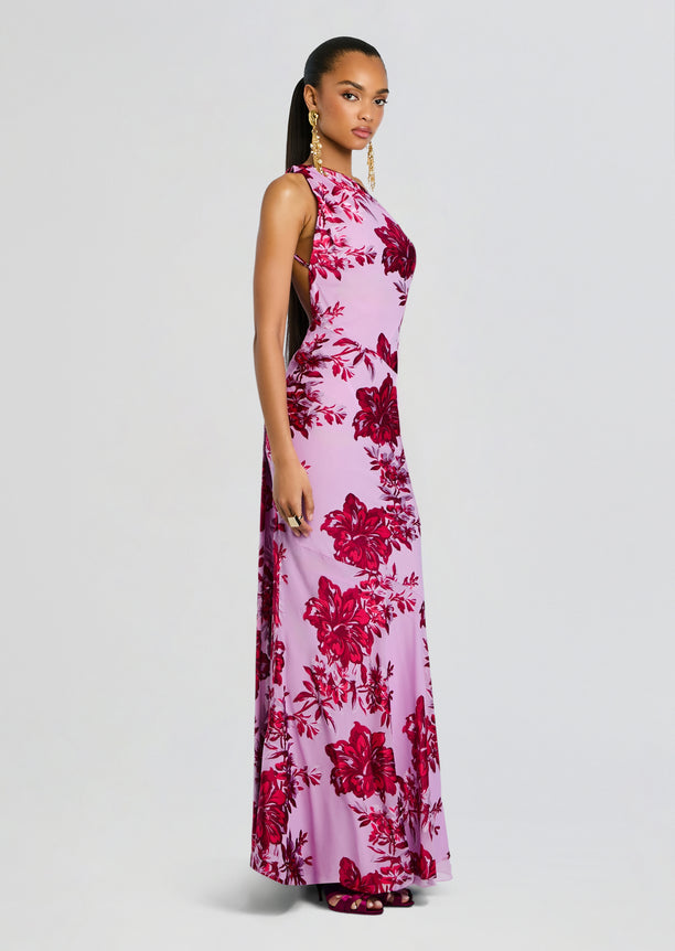 Lorenna Dress pink floral print shown in side profile on a model wearing the full-length gown