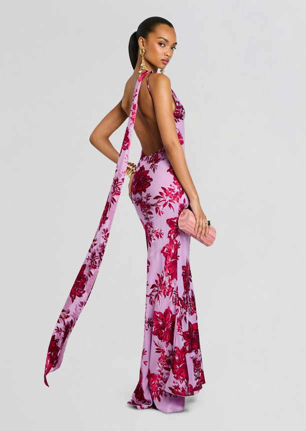 Lorenna Dress in pink lavender floral print with open back and a long draped sash over the shoulder.