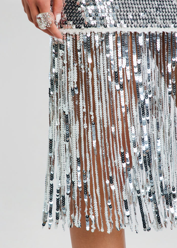 Close up of Nalu Sequin Fringe Crochet Dress showing silver sequins and long fringe strands. media 2 of 5