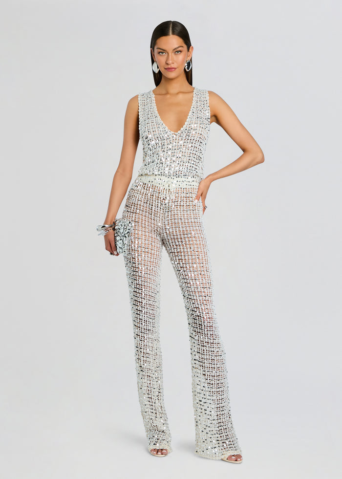 Silver sequin crochet jumpsuit with a deep V neckline and wide-leg pants media 1 of 5