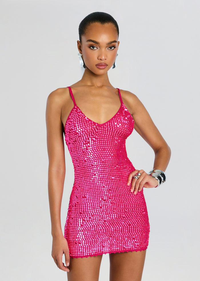 Close up of model in hot pink sequin crochet mini dress with a V neckline and thin straps media 5 of 5