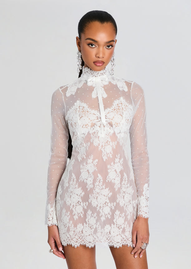 Faylin Lace Dress white lace mini dress with sheer sleeves and a high neck bow detail