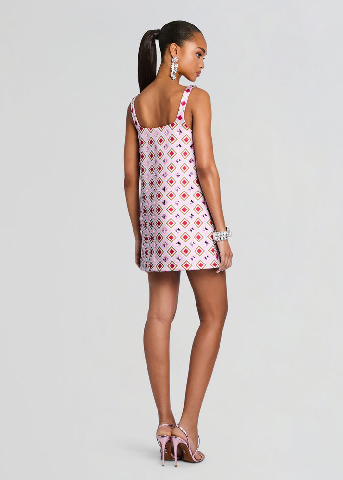 Back view of a pink diamond print Zephyra Embellished Dress worn by a model with a sleek ponytail. media 5 of 6