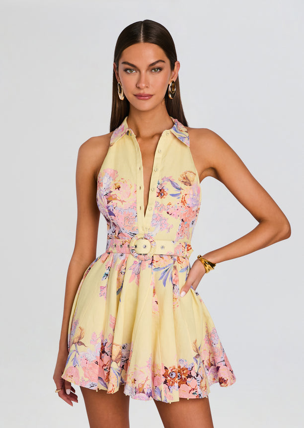 Kysha Short Dress with Belt Buckle in pale yellow floral print worn by a model