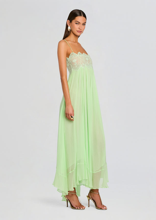 Mint Gypsy Chiffon Dress with lace bodice and flowing skirt worn by a model in gold strappy heels