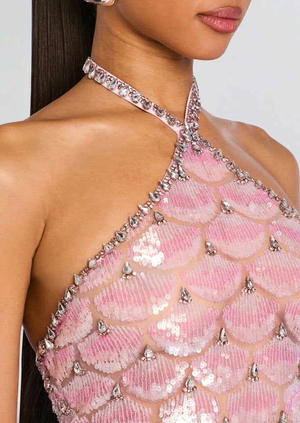 Close up of Ninette dress neckline showing pink sequin scalloped pattern and crystal trim along halter