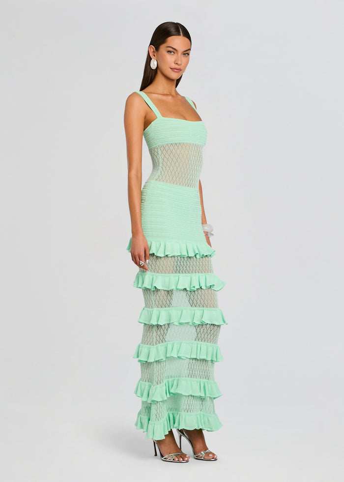 Mint Thora Knit Dress on a model with a mesh lattice waist panel and tiered ruffle hem. media 3 of 5