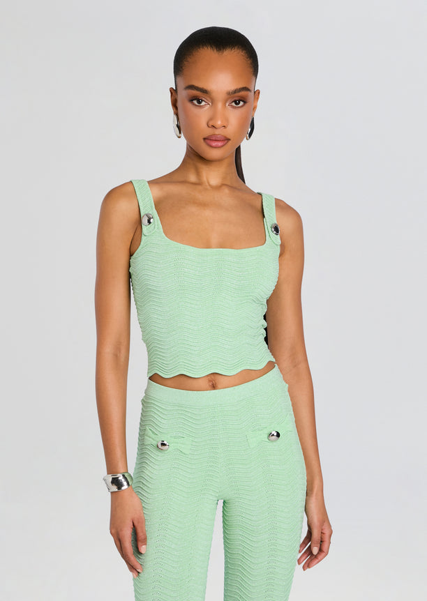 Front view of mint green rib knit crop top with wide straps and matching high-waisted pants