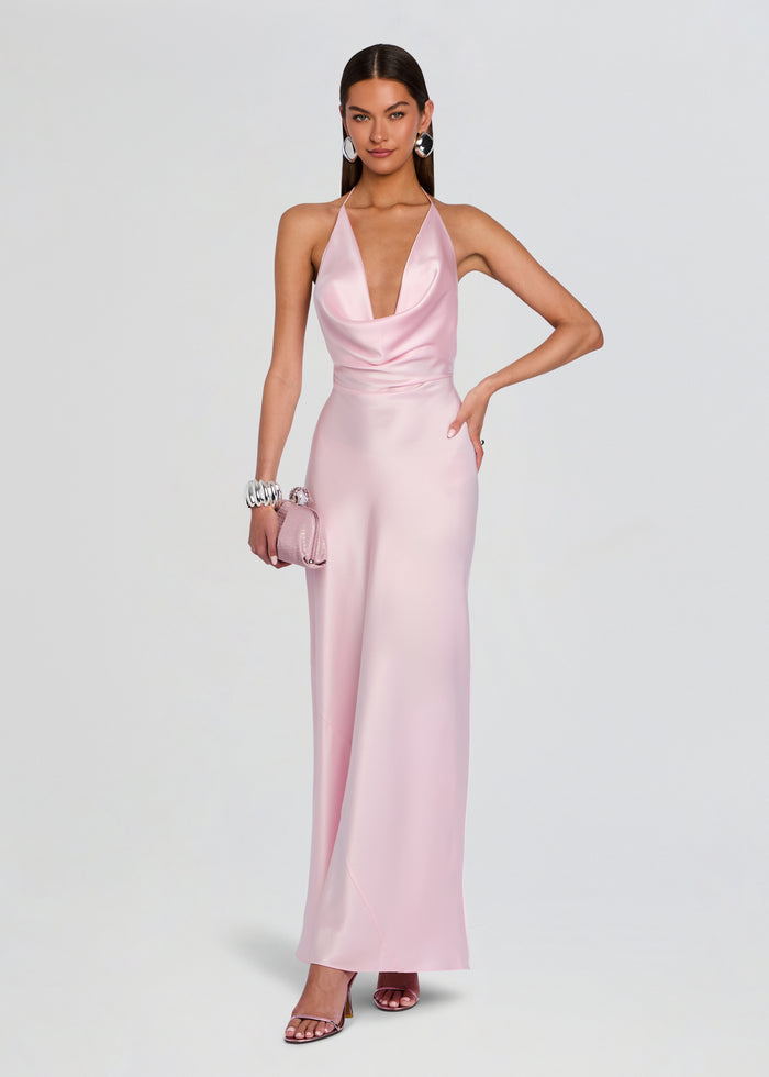 Pink satin Cinque Terre Dress on a model with a halter neckline and floor-length skirt media 1 of 5
