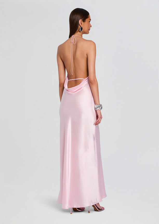 Back view of a pale pink satin Cinque Terre Dress with a halter tie and draped back.