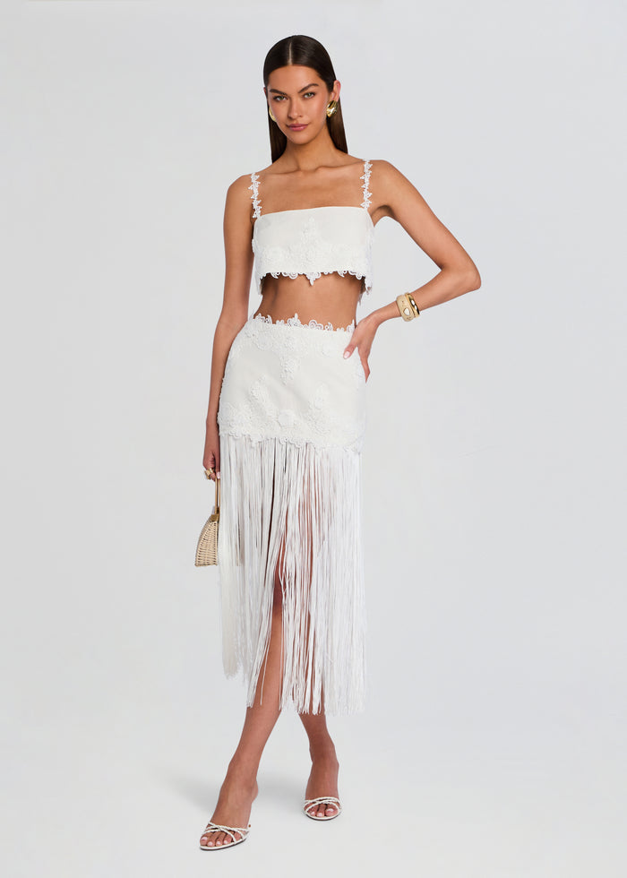Amaris Skirt shown as a white lace fringe midi skirt with a high waist and long fringe hem. media 2 of 5