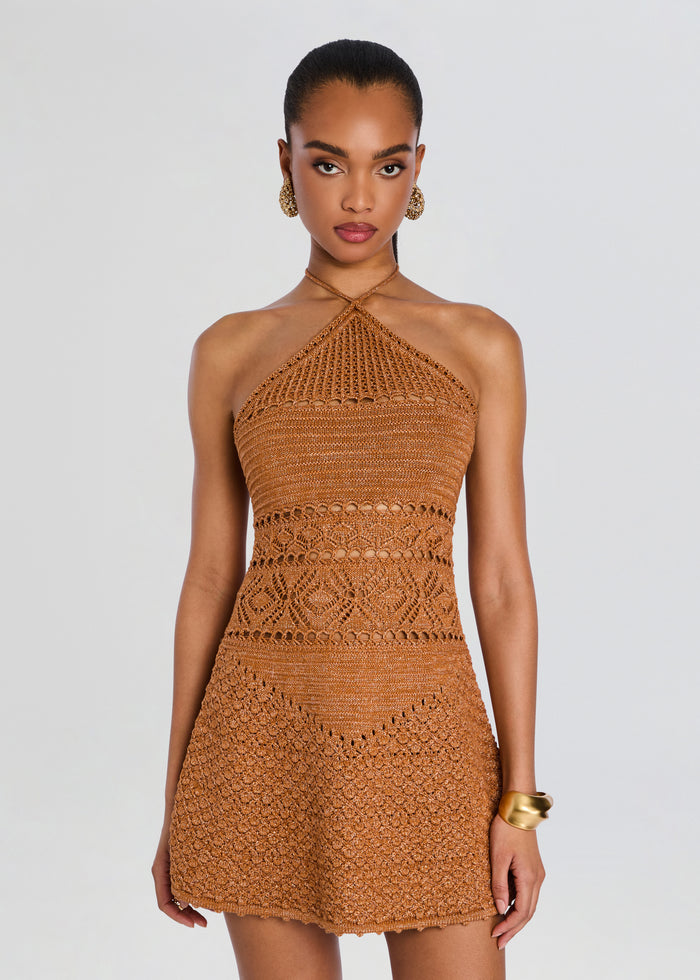 Copper crochet halter dress with high neck and fitted silhouette on a model media 5 of 5