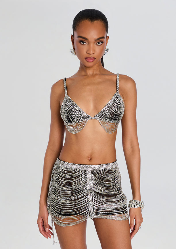 Model wearing Jetta Chain Bra set with crystal fringe bra and matching beaded mini skirt.
