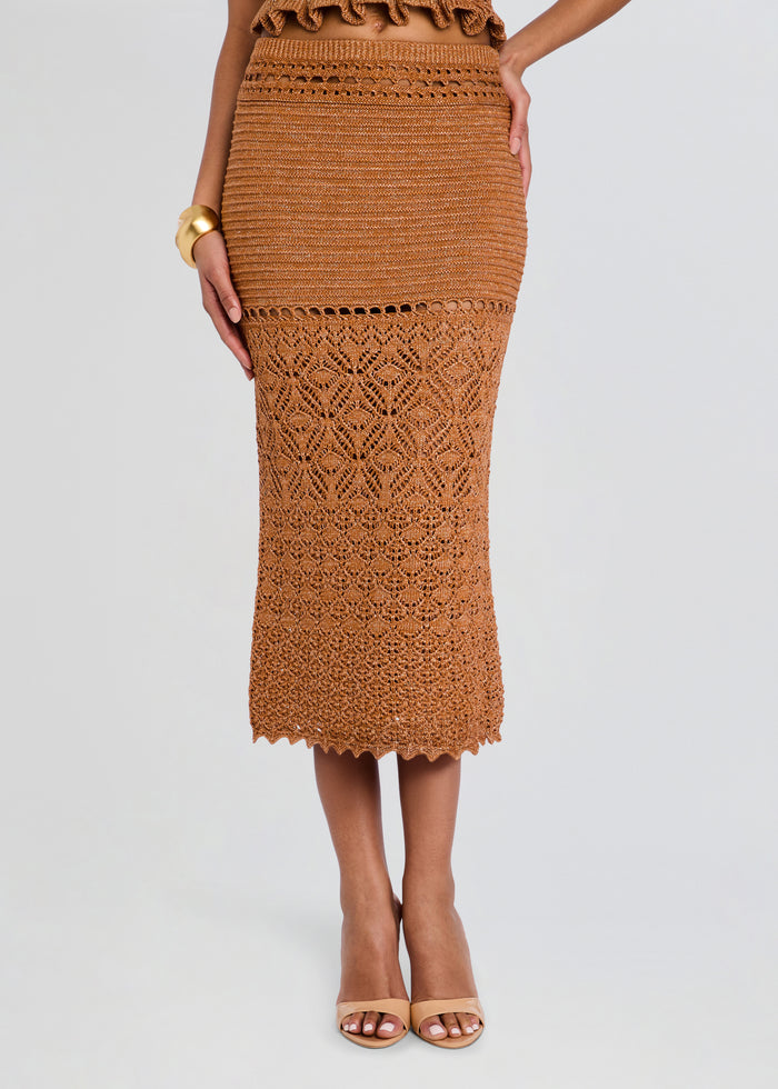 Close up of the tan crochet skirt detailing with intricate lace pattern and scalloped hem. media 1 of 5