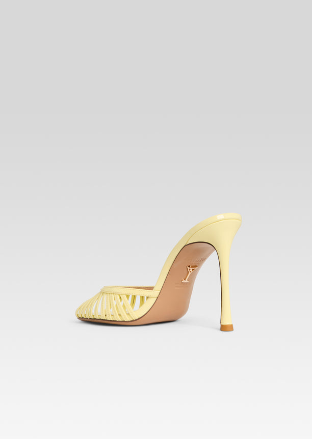 Allistair Sandal pale yellow side view with a slim stiletto heel and delicate toe strap