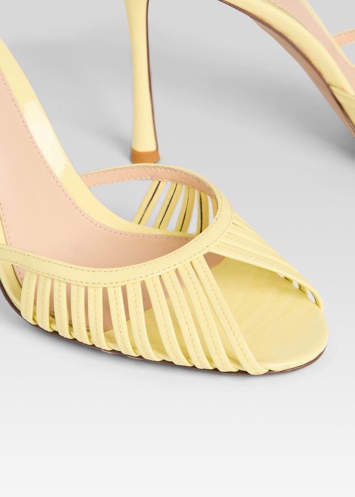 Close-up of pale yellow Allistair Sandal front showing slender woven straps across the toes media 3 of 5
