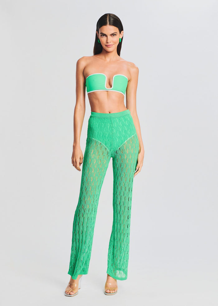 Model in green Dylan Knit Long Pant with matching bandeau top and clear sandals media 2 of 5