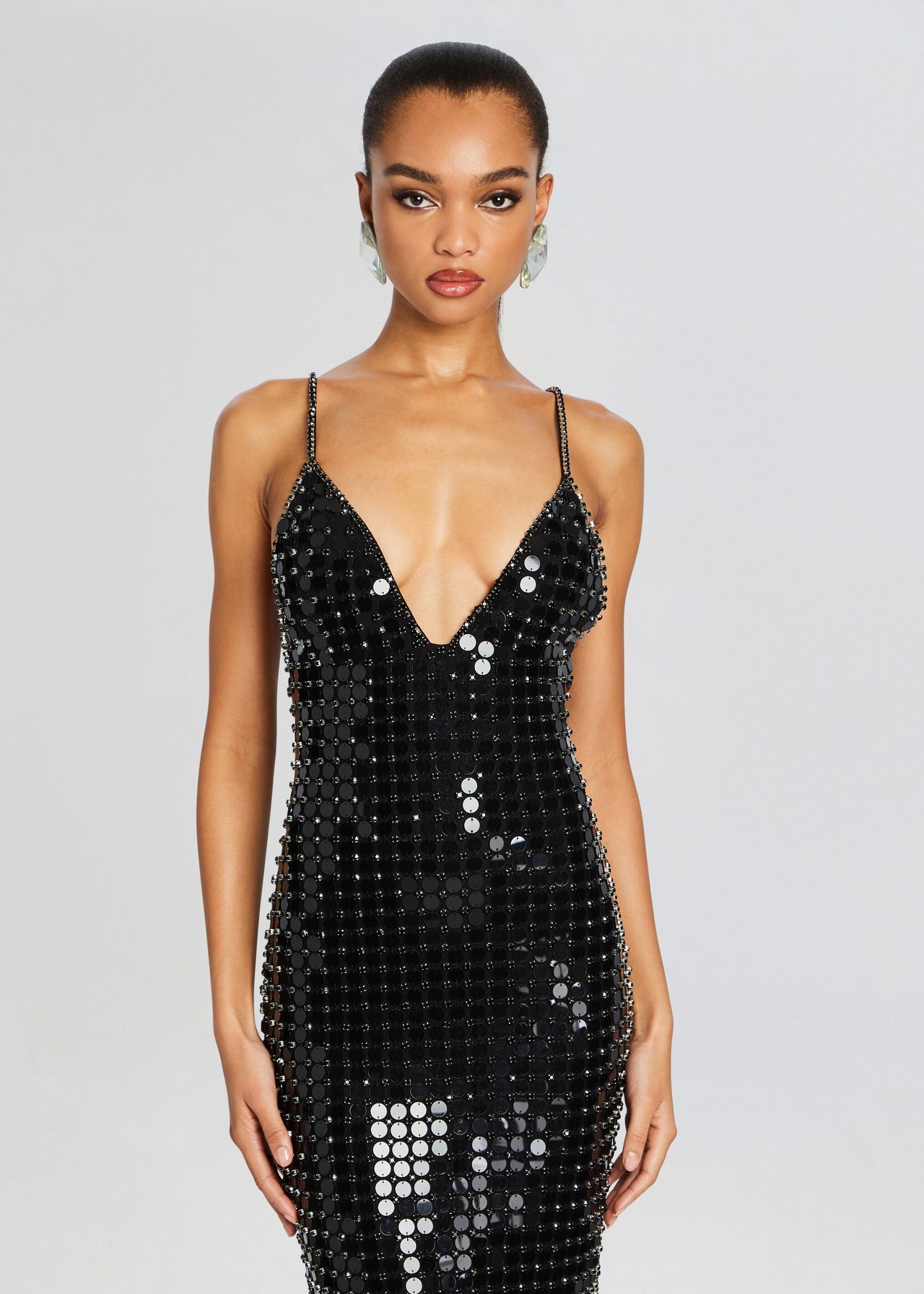black sequin perris dress The Empire Sequin Dress. Black sequins creates a powerful glow, reflecting light and confidence in every movement