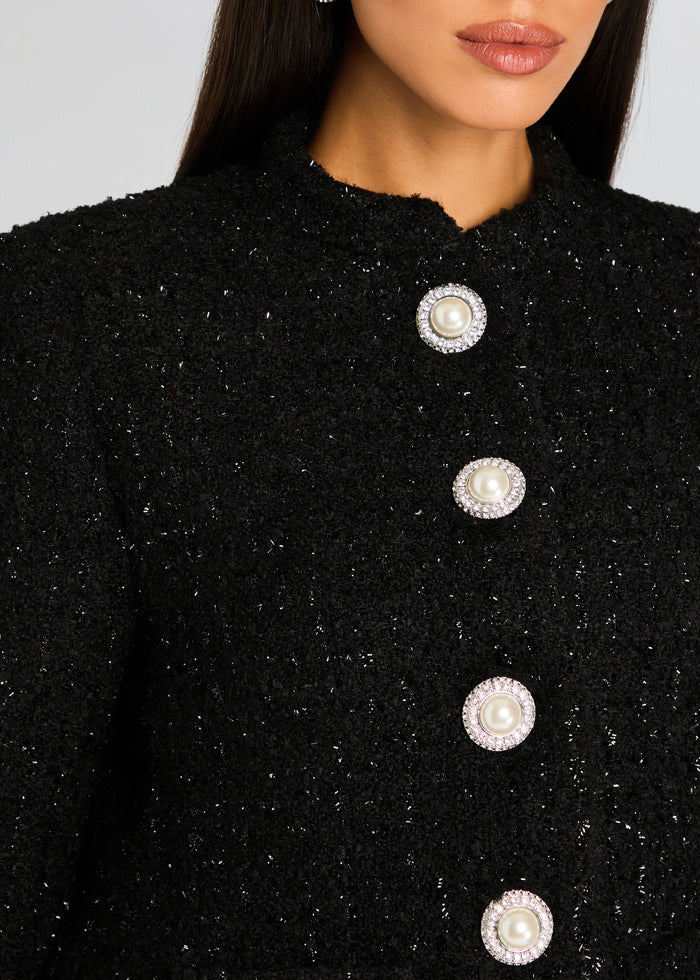 Close up of Carole Jacket showing textured black fabric and pearl button embellishments media 2 of 5