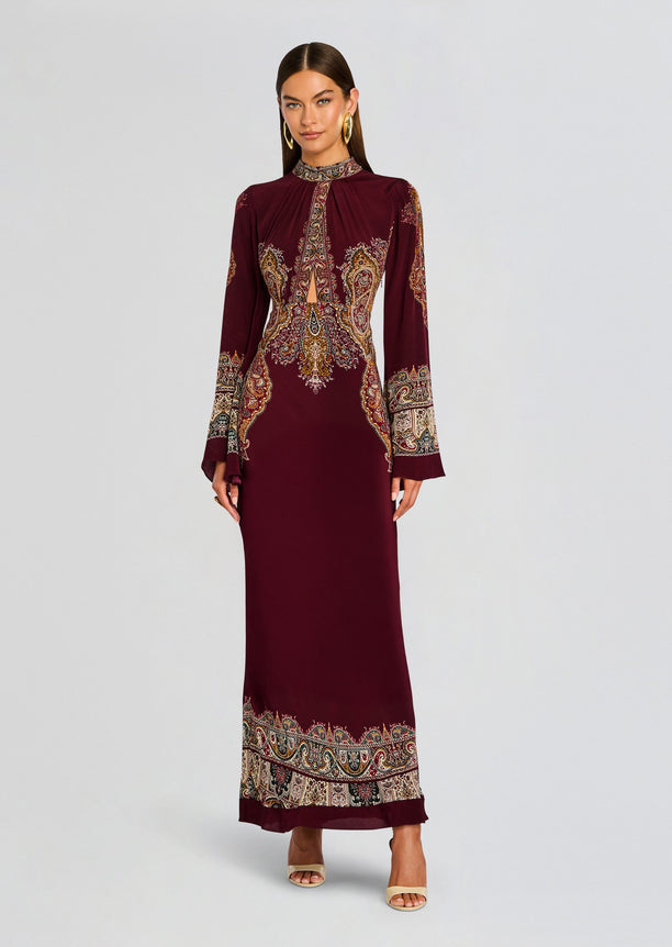 Shifa Long Dress in burgundy with ornate paisley print, high neck and long sleeves.