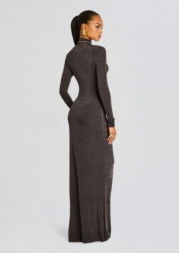 Back view of the dark charcoal Kim Maxi Dress on a model, slim silhouette with long sleeves and ankle length