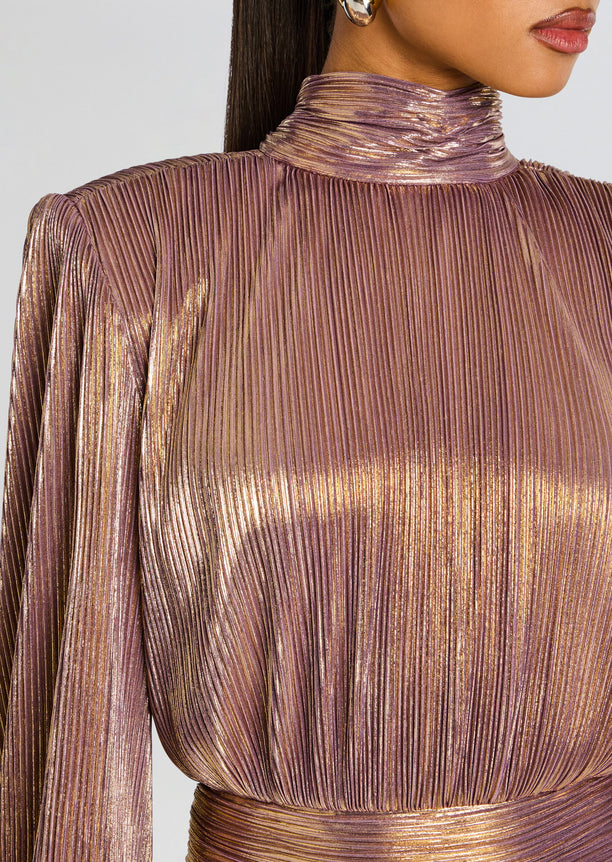 Close-up of rose gold metallic pleated fabric on Brienne Dress showing the high neck and rich texture.