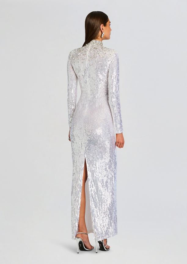 Back view of the Elisha Embellished Dress in silver sequins with a high neckline and long sleeves, featuring a center back zipper.