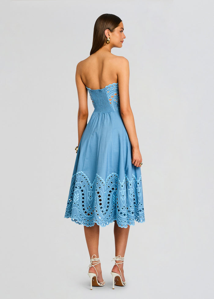 Back view of the blue Marlin Long Dress showing a smocked back and a hem with embroidered scallops. media 4 of 5