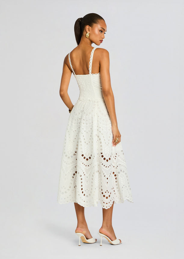 Back view of ivory eyelet Solace Long Dress with scalloped straps and a fitted corseted bodice.
