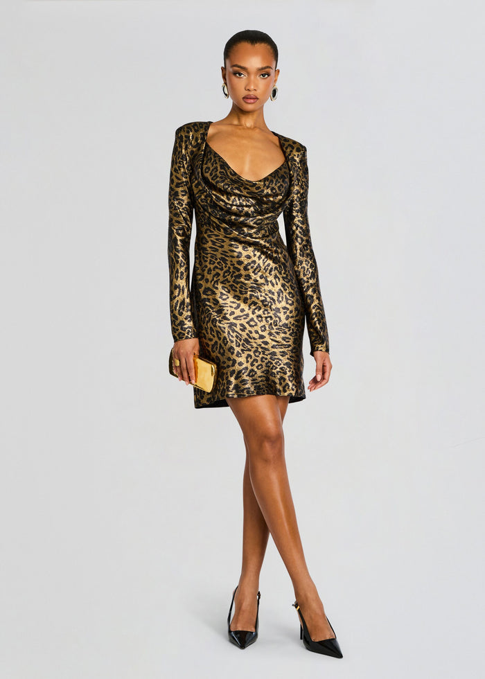 Front view of a model in a metallic gold leopard print long sleeve mini dress with a draped neckline. media 1 of 5