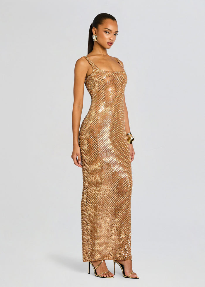 Front view of Xiomara Sequin Dress a gold floor-length sequined gown with straps and a square neckline on a model media 4 of 6
