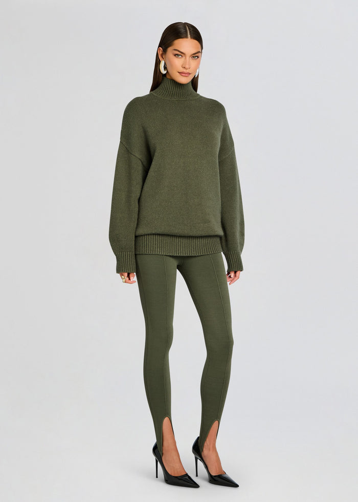 Full-length olive Beatrice Sweater outfit with oversized knit sweater and matching pants and heels media 4 of 5