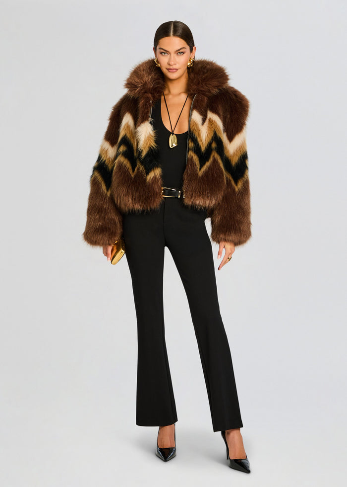 Model in Kristen Perfect Work Trouser with a brown multicolor zigzag faux fur jacket and black heels. media 6 of 6