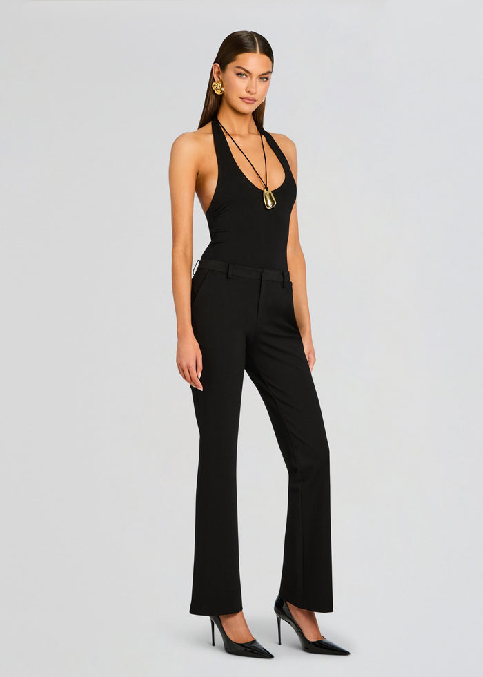 Model wears Kristen Perfect Work Trouser with a black halter top and black heels. media 4 of 6