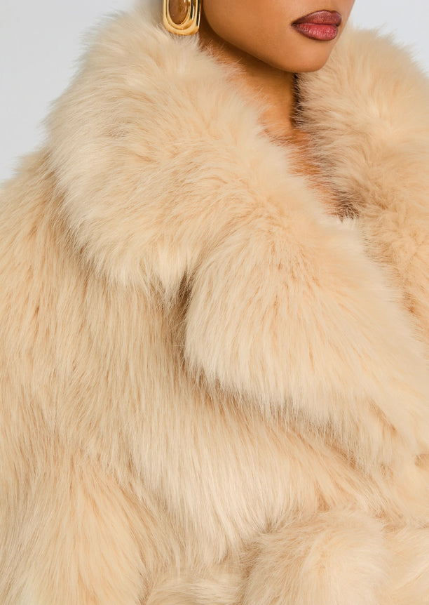 Close up of the cream fur texture on the Magali coat.