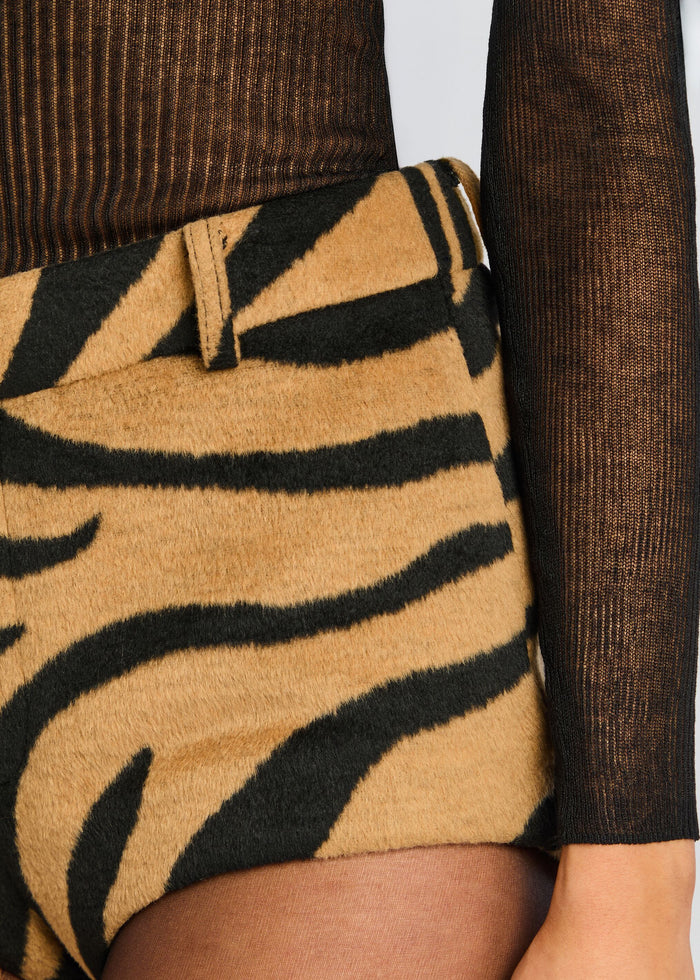 Close up of tiger stripe fabric on the Katerina Short with belt loop and black sheer sleeve. media 3 of 5