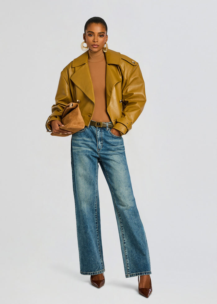 Model wearing Ballet Turtleneck Bodysuit with a camel leather jacket and blue denim jeans. media 6 of 6