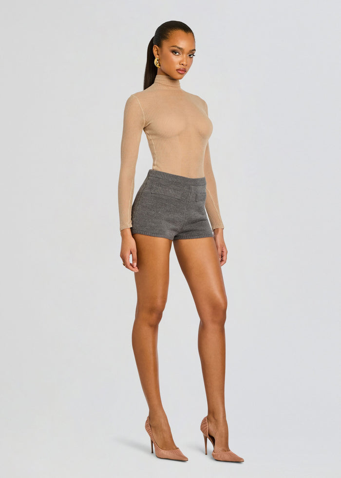 Front view of a model in the Lilian Knit Short set with a beige turtleneck and gray knit shorts media 5 of 5
