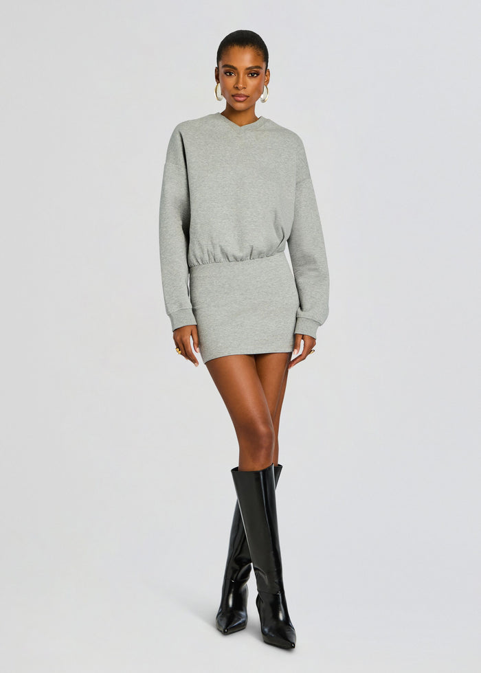 Grey Dionne mini dress on model with long sleeves and a fitted mini length media 1 of 5