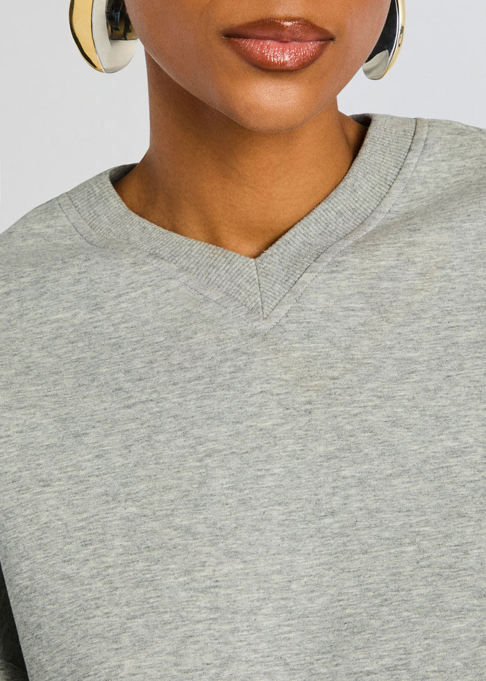 Dionne Mini Dress neckline close up in light gray knit with a V shaped ribbed collar media 2 of 5