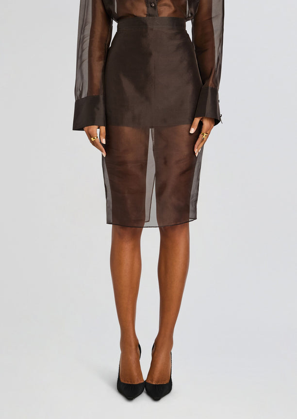 Estella Silk Midi Skirt close up showing sheer overlay at the waist and hem with a dark satin underlayer.