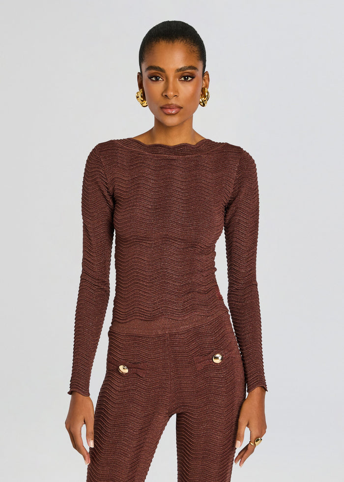 Galina Rib Knit Top in brown with long sleeves and a subtle wavy rib texture on a model. media 1 of 5