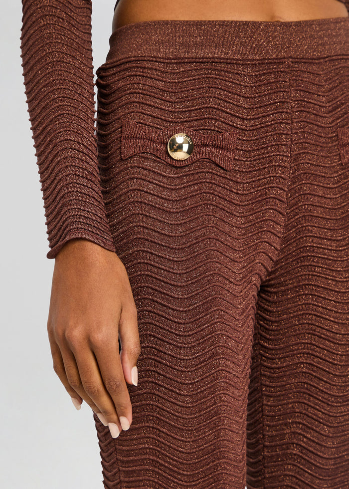 Waist detail of Joliet Rib Knit Pant showing textured waves and a gold tone button on the pocket. media 3 of 5