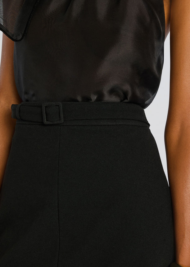 Close-up of a black Jane A-Line Mini Skirt with belt at the waist