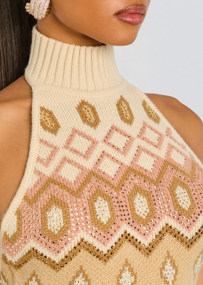 Close up of Marva Knit Dress fabric showing ivory knit with pink and gold diamond patterns and rhinestone embellishments media 3 of 6