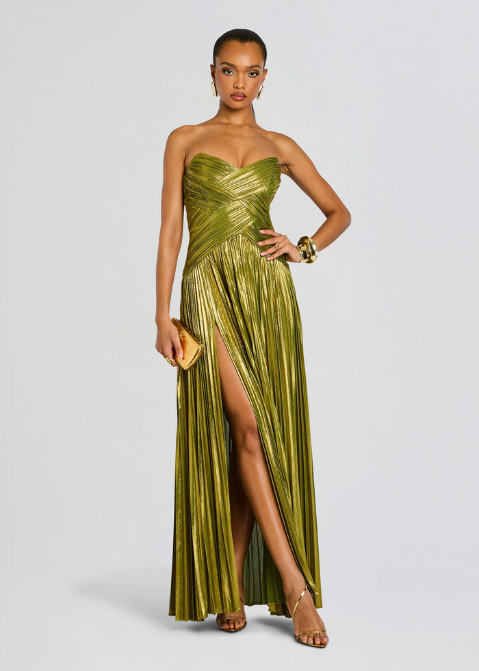 Stephie Dress metallic olive green strapless gown with wrapped pleats and a thigh high slit held by model with a gold clutch media 1 of 5