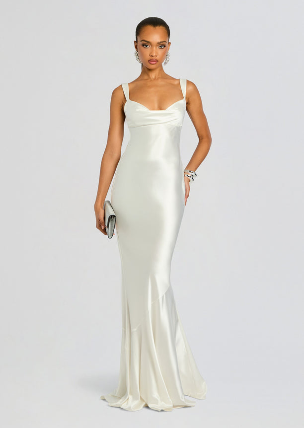 Front view of the Vinicia Dress a cream satin gown with wide straps a draped neckline and long flowing train.
