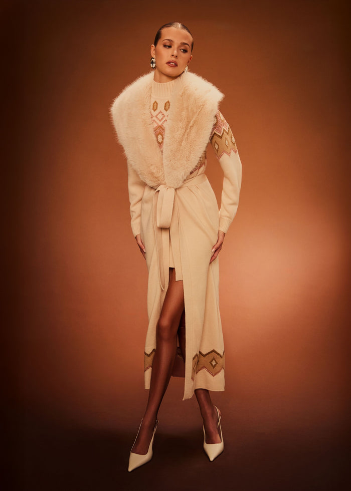 Cream knit coat with an oversized plush faux fur collar and a tie waist belt media 2 of 6